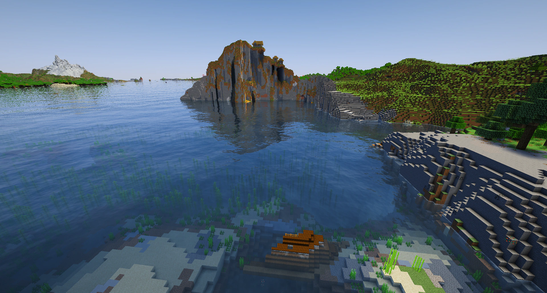 A plains village on top of a towering ocean cliff
