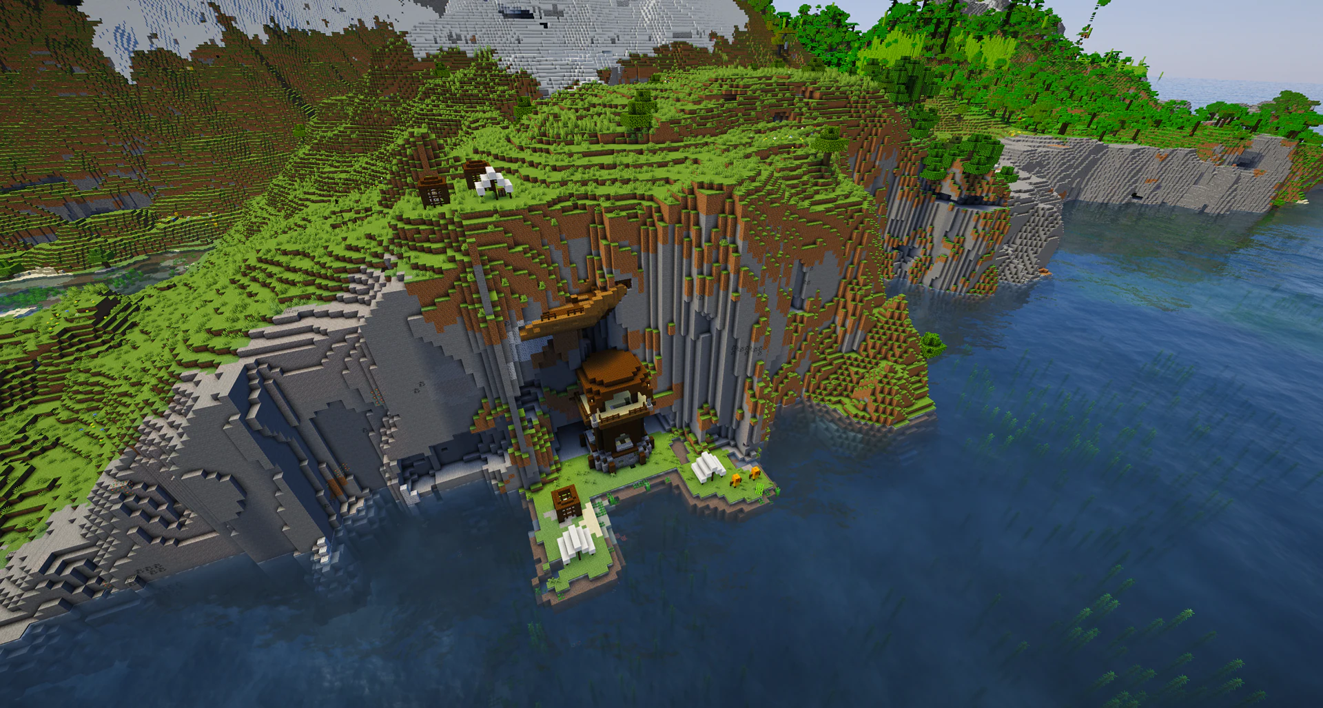 A pillager outpost generated inside a huge ocean cliff under a shipwreck