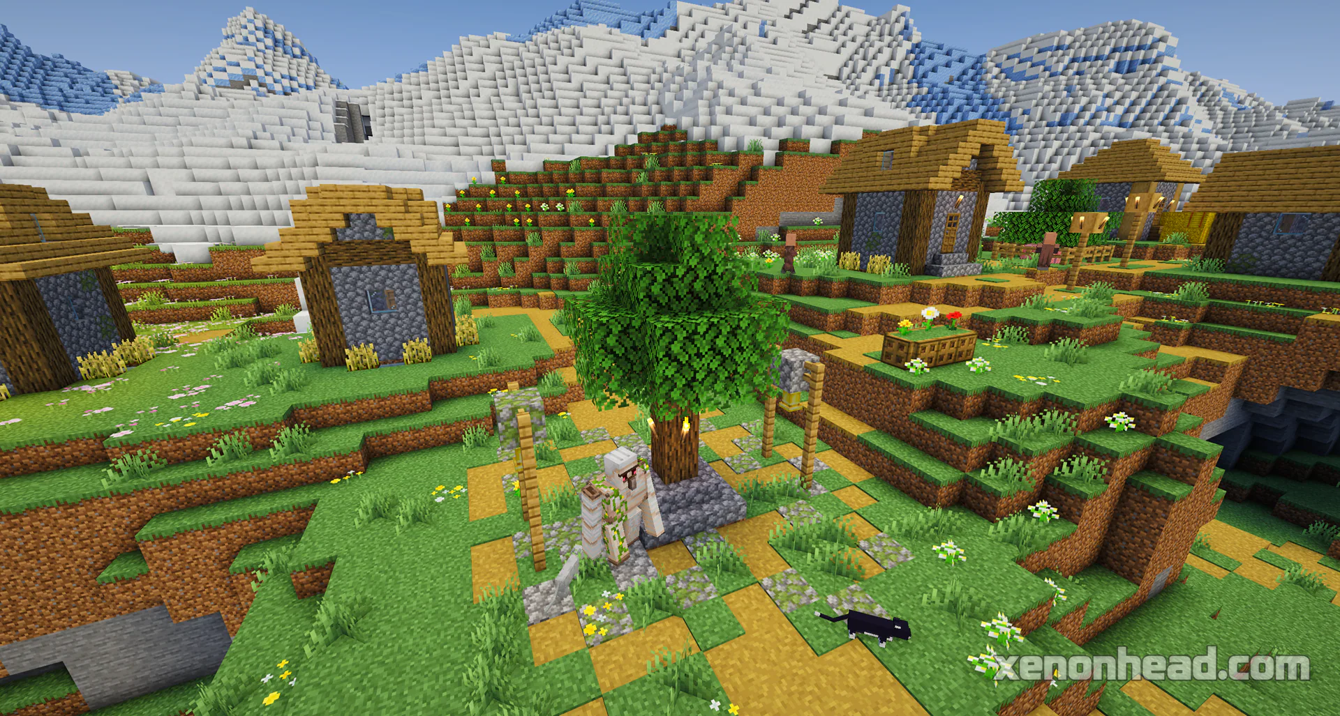A cozy plains village spawned perfectly inside a huge circular snowy mountain range