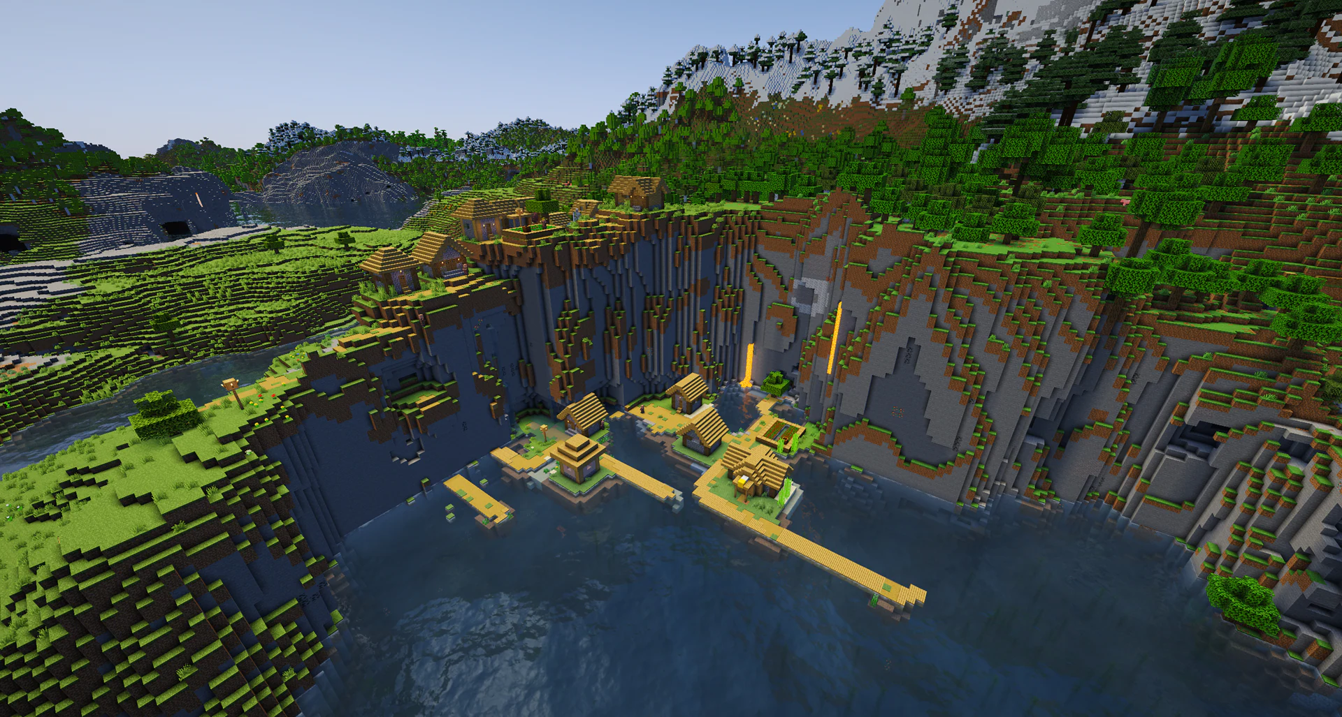 Cliffside village snowy mountain backdrop
