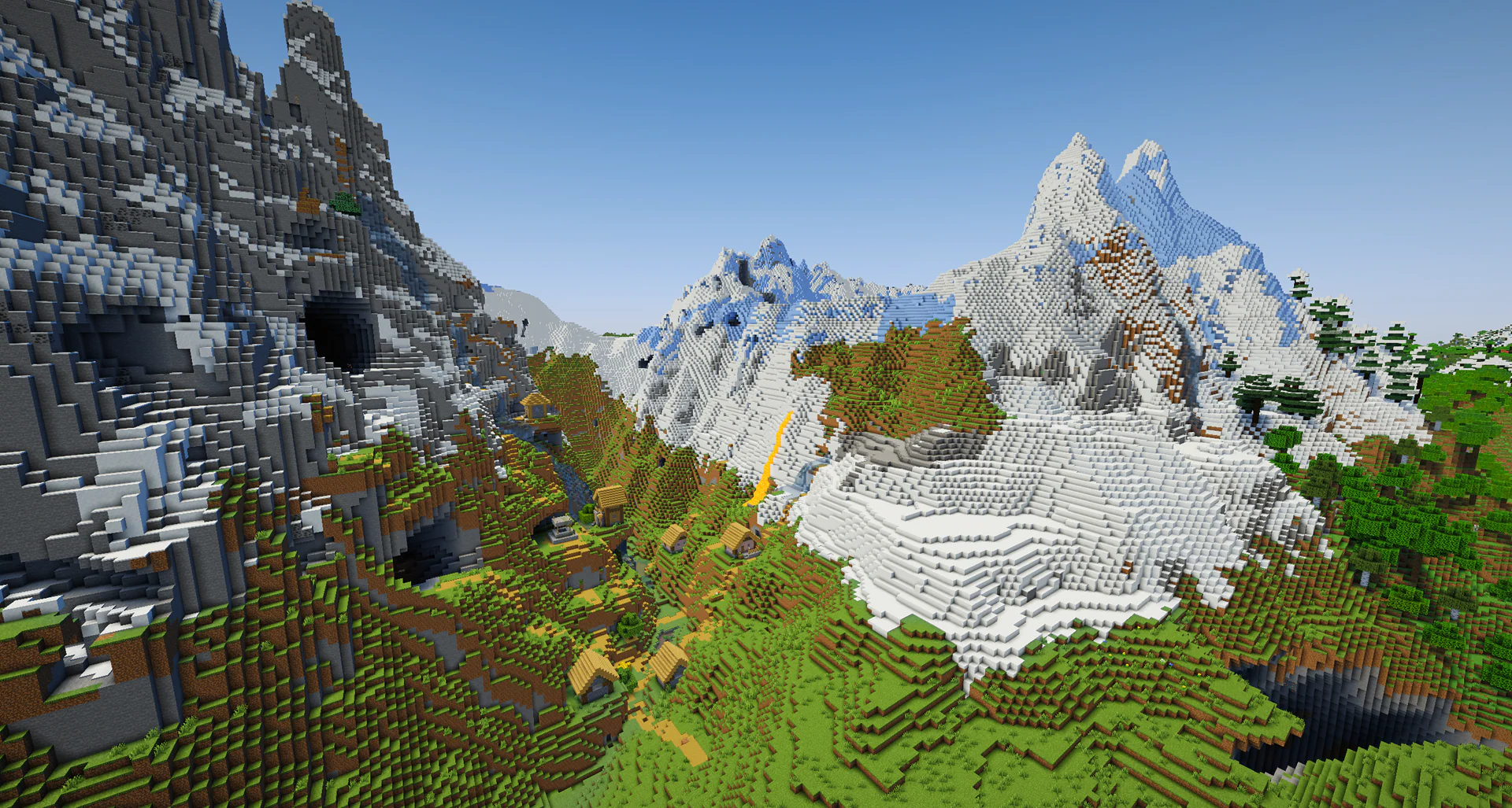 A village nestled in a valley tucked right between two huge jagged mountains