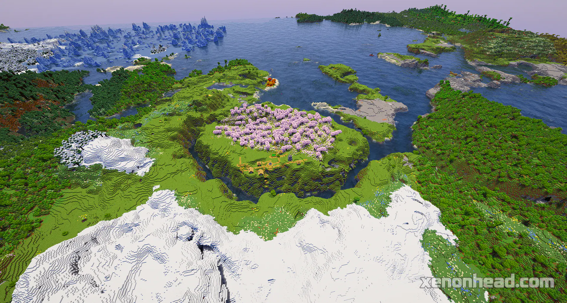 A huge ravine cutting right between a pink cherry village and snowy mountain peaks