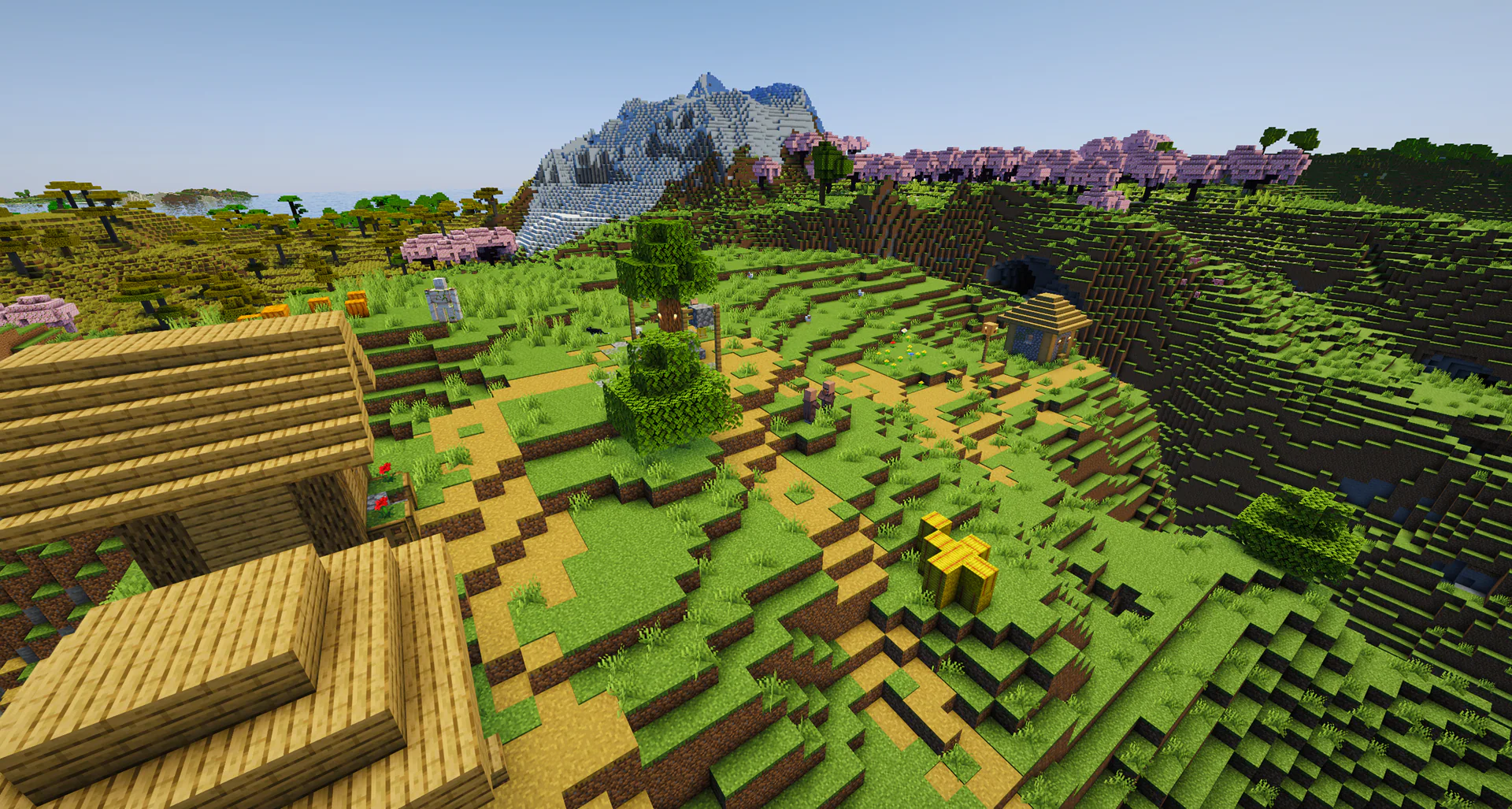 A village on a hill island in a crater ringed by cherry groves