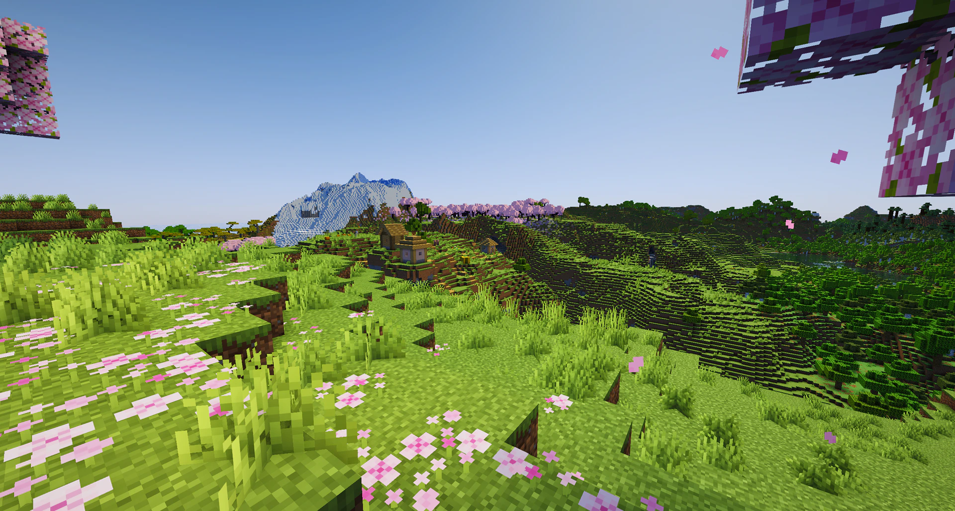 A village on a hill island in a crater ringed by cherry groves